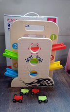Portable Wooden Ramp Racer playset showing the convenient carry handle and cars.