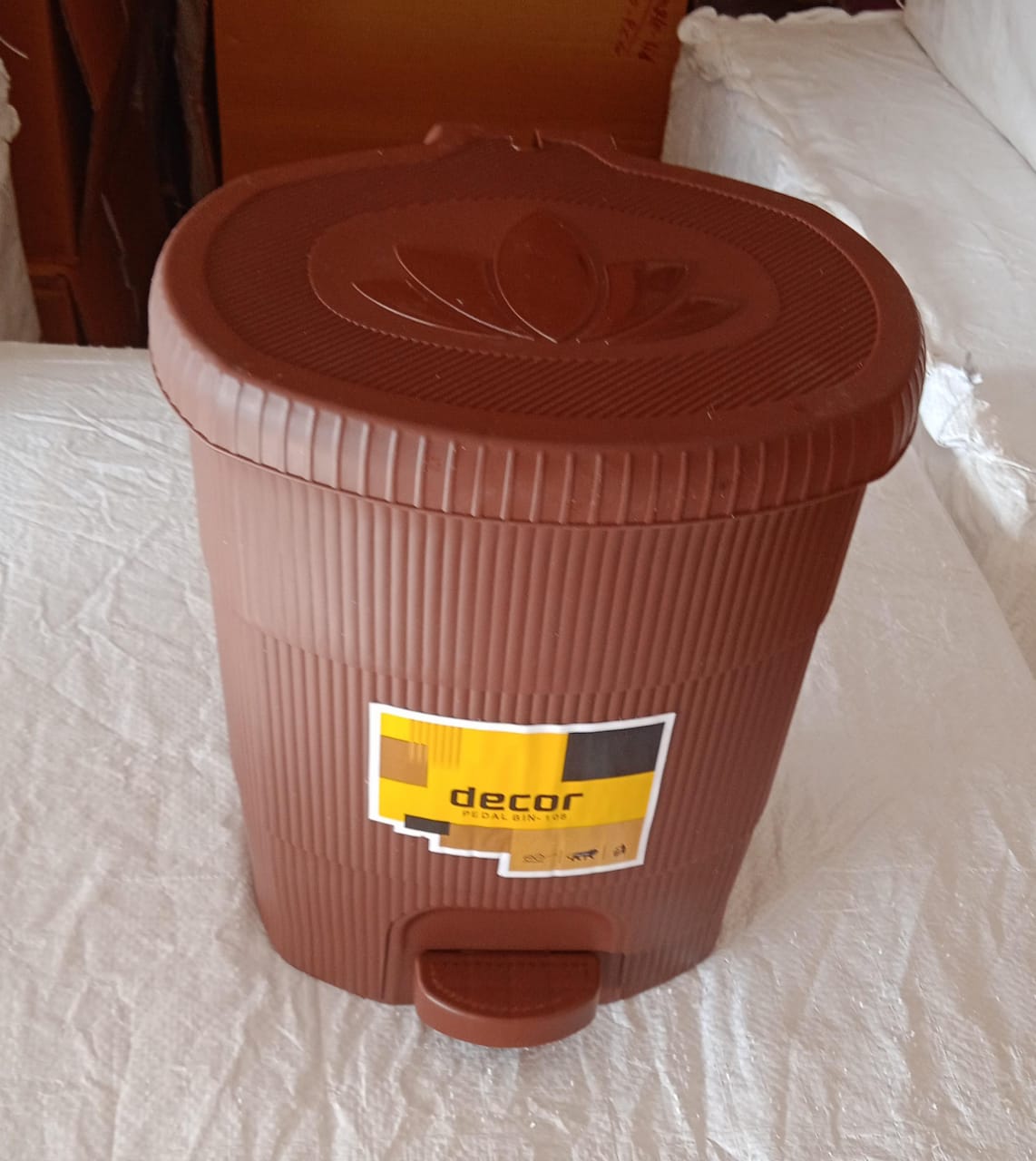 Collage showcasing various angles of the versatile mini pedal dustbin.