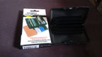 Multiple JourneyMate waterproof card holders neatly stacked, illustrating their compact and uniform design.