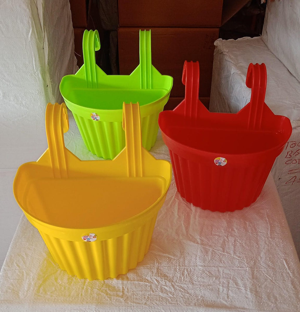 Decorative plastic hanging planter enhancing the aesthetic of a modern Indian home.