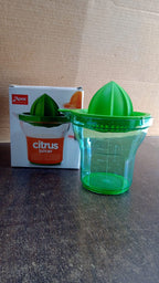 Hand holding Apex Manual Citrus Juicer for effortless fresh juice extraction