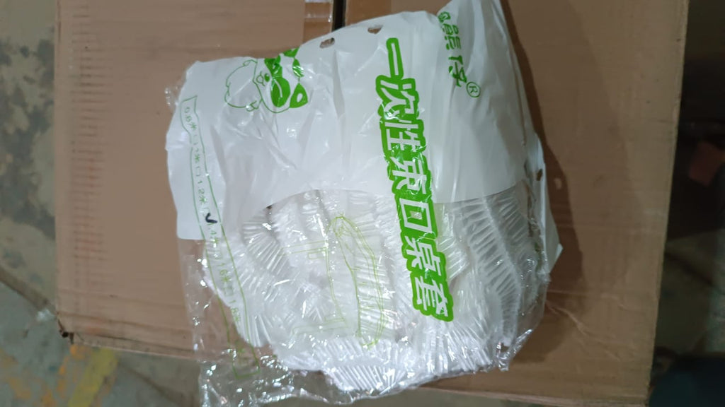 Stack of multiple packaged elastic table covers, showcasing the 10-piece set.
