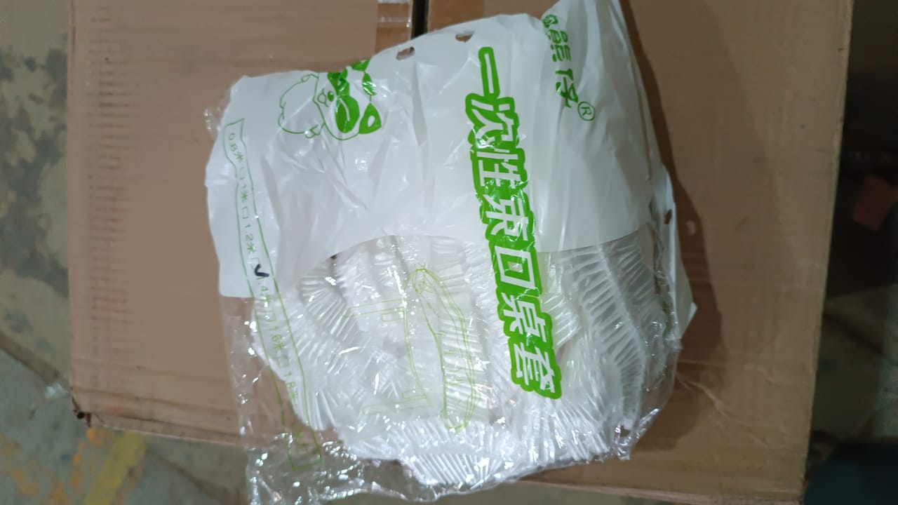 Stack of multiple packaged elastic table covers, showcasing the 10-piece set.