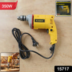 Electric drill showing ergonomic design and power in use