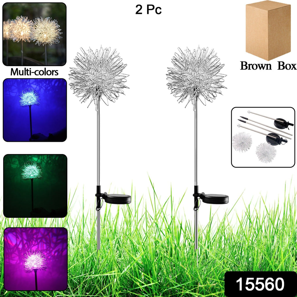 Solar color changing dandelion garden lights glowing in multicolor in outdoor garden