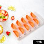Silicone fruit mold creating decorative cake embellishments.