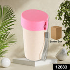 A durable wheat straw travel mug with its lid securely in place, ready for your commute.