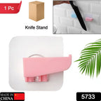 Step-by-step diagram illustrating the easy drill-free installation process of the adhesive knife holder on a smooth kitchen surface.