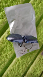 Lifestyle shot of the keychain nail clipper in a travel setting.