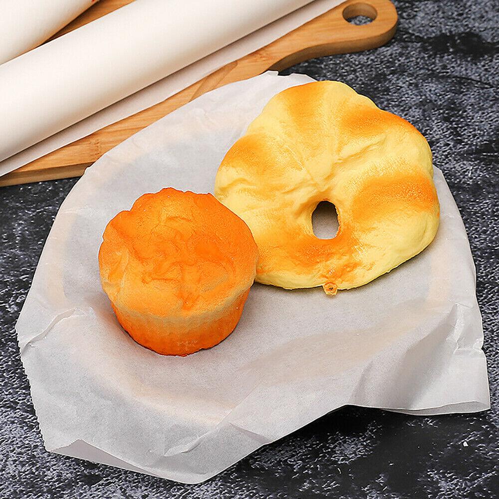 Close-up of a tightly wound roll of non-stick parchment paper.