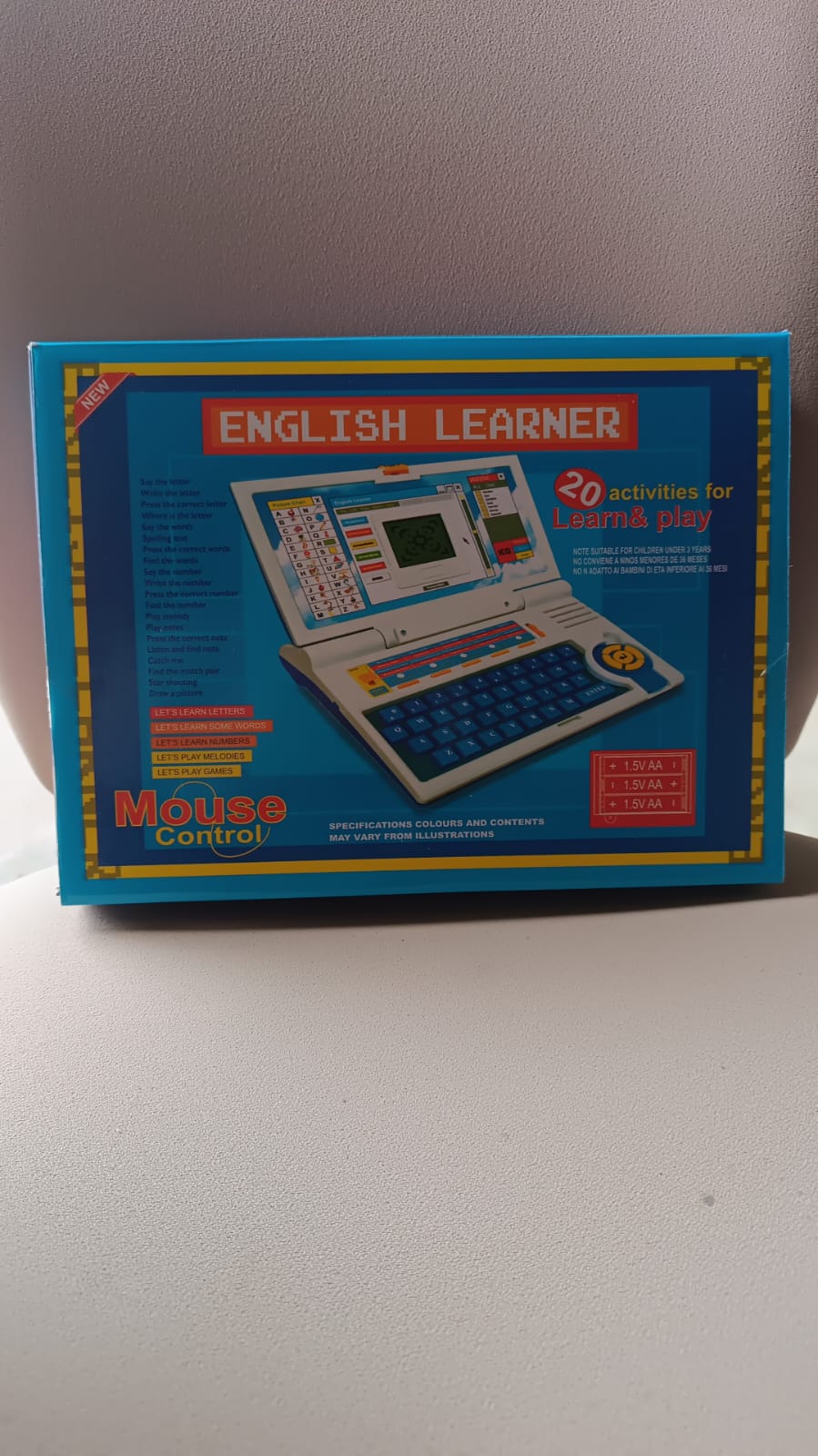 Side view of English Learner Educational Laptop Toy in multicolor design
