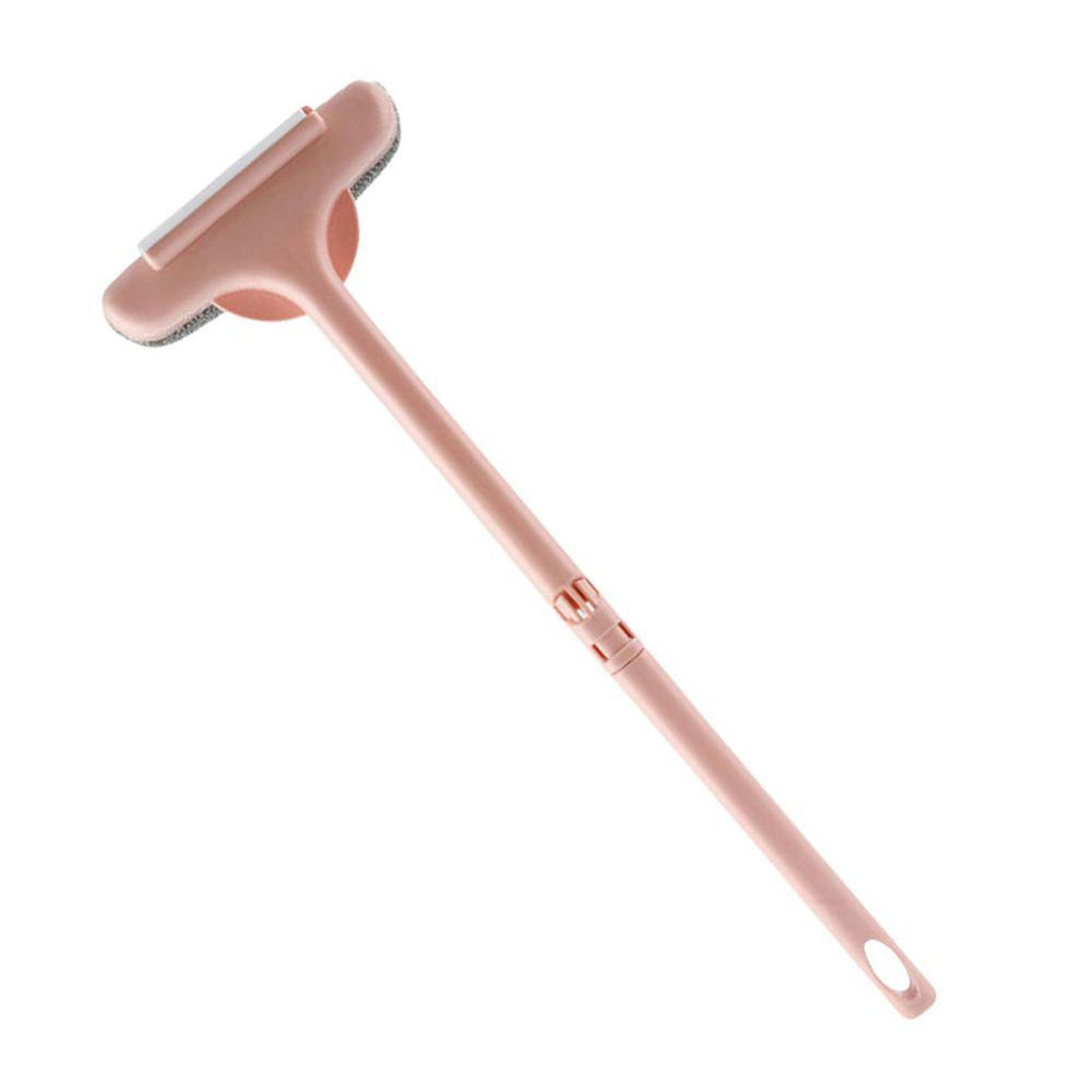 The Mesh Cleaning Brush conveniently hanging by its built-in hole for easy storage.
