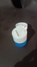 Front view of the Organivo 4-in-1 portable medicine cutter and storage box.
