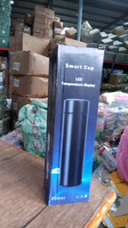 Smart temperature flask with a sturdy handle, ideal for travel.