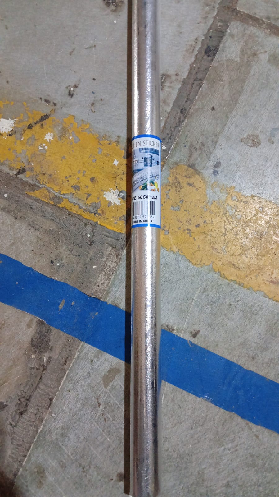 Unrolled Self-Adhesive Aluminum Foil Wallpaper showing its design and size.