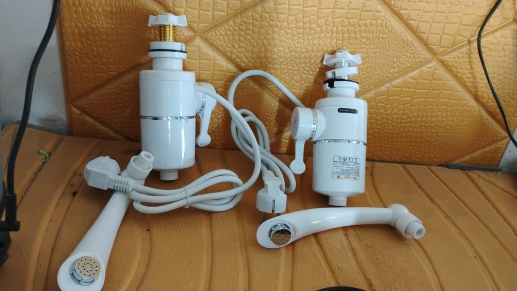 Electric water heater faucet photo showing installation in kitchen or bathroom