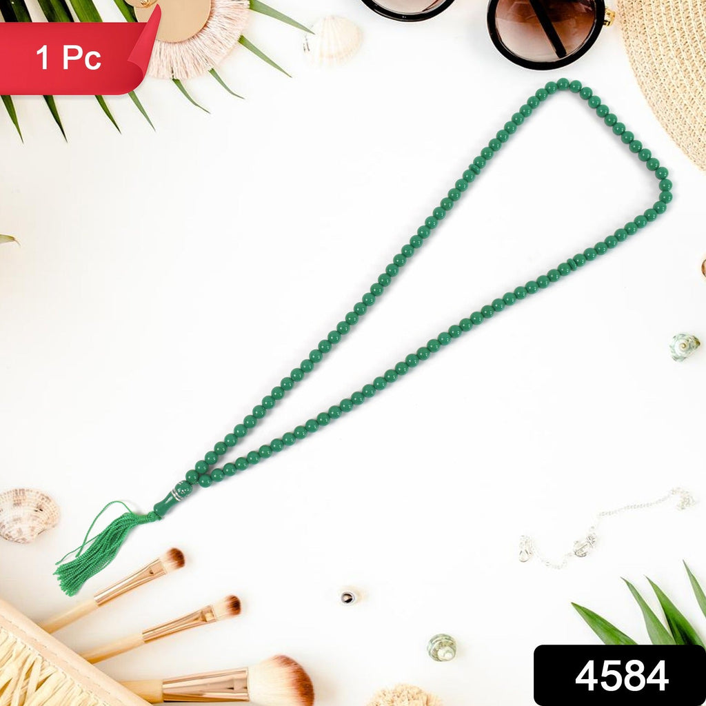 Close-up of a 99-bead Islamic tasbih, highlighting the separator beads.
