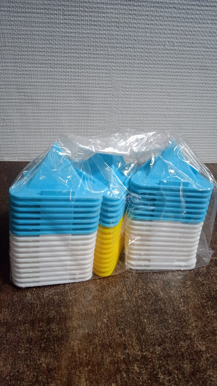 Packaging of the pyramid mobile stand, ensuring safe delivery.