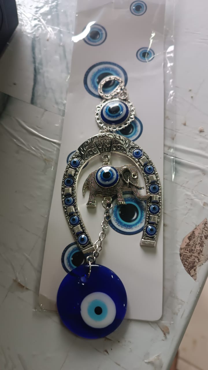 Evil eye charm wind chime with horseshoe design for home and car decor