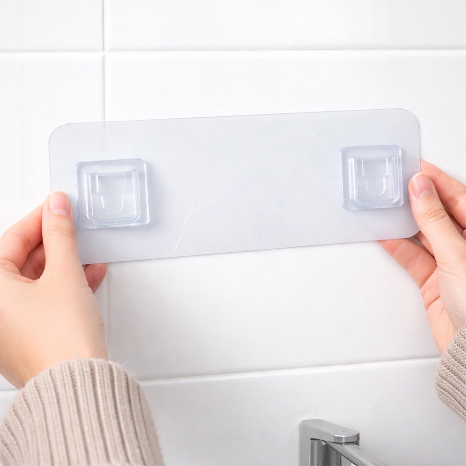Kitchen and bathroom hanging rack with adhesive backing