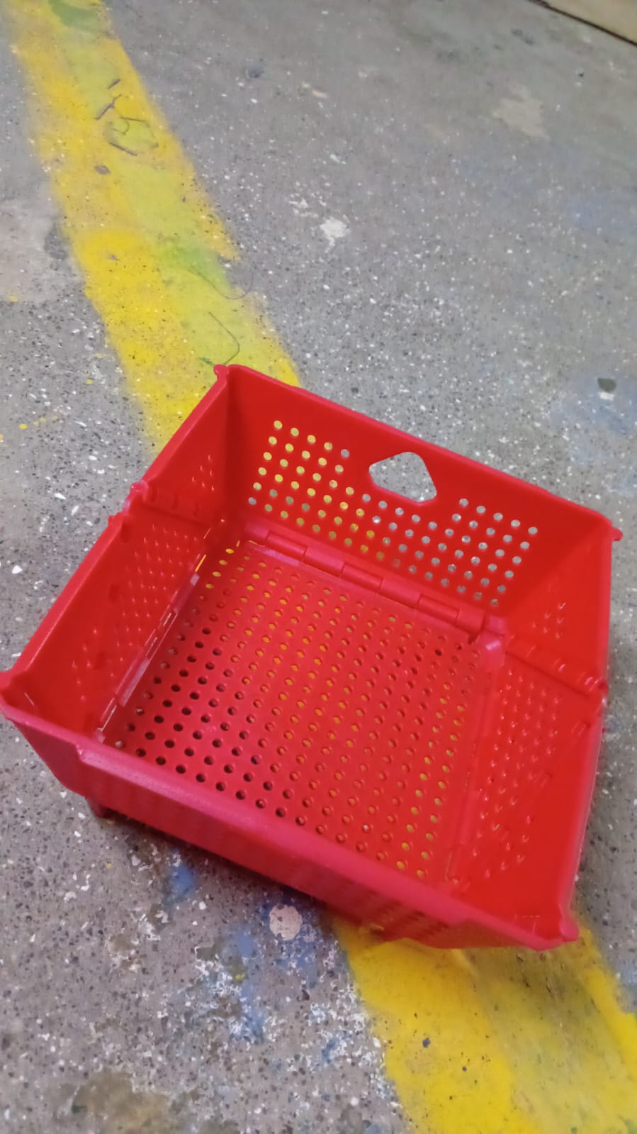 Compact folded storage basket demonstrating its space-saving design.