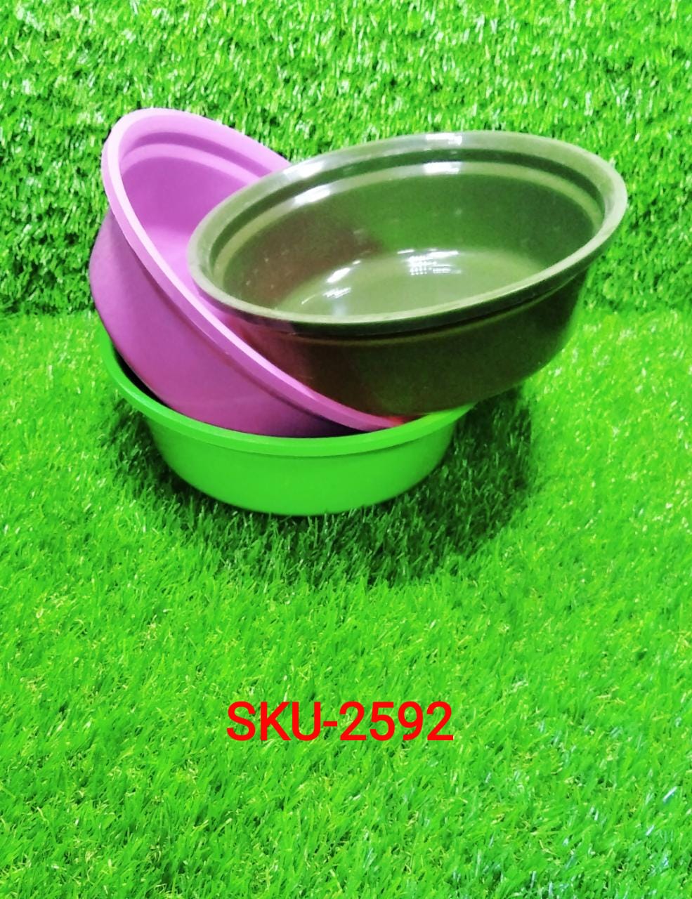 Set of plastic storage bowls shown with their retail packaging.