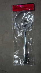 Frying filter spoon with clip used in a modern kitchen setting.