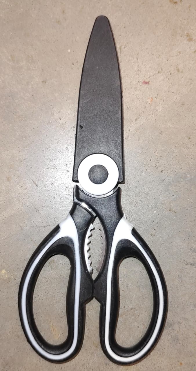 Angled view of the  Multi-Function Kitchen Scissor showcasing its ergonomic design.
