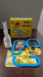 Small duck toy on staircase track designed for toddlers