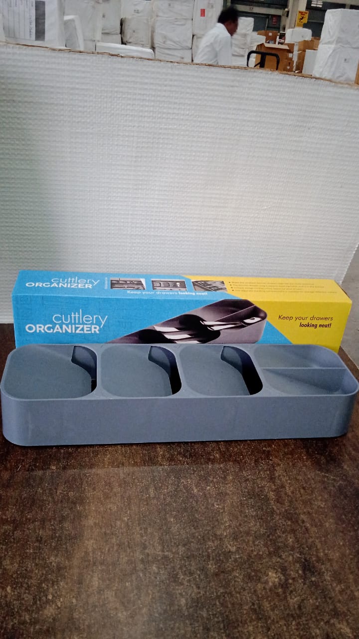 Overhead view of the empty cutlery tray, showcasing its distinct utensil icons for easy sorting.