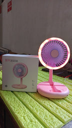 Packaging of the portable fan, indicating its brand and key features.