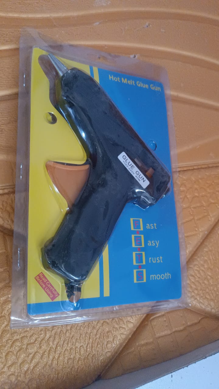 Portable sized hot melt glue gun ideal for crafts and repairs