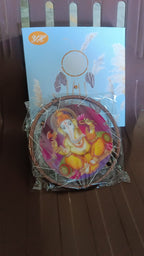 Vertical view of Lord Ganesh Wind Chimes in natural outdoor light