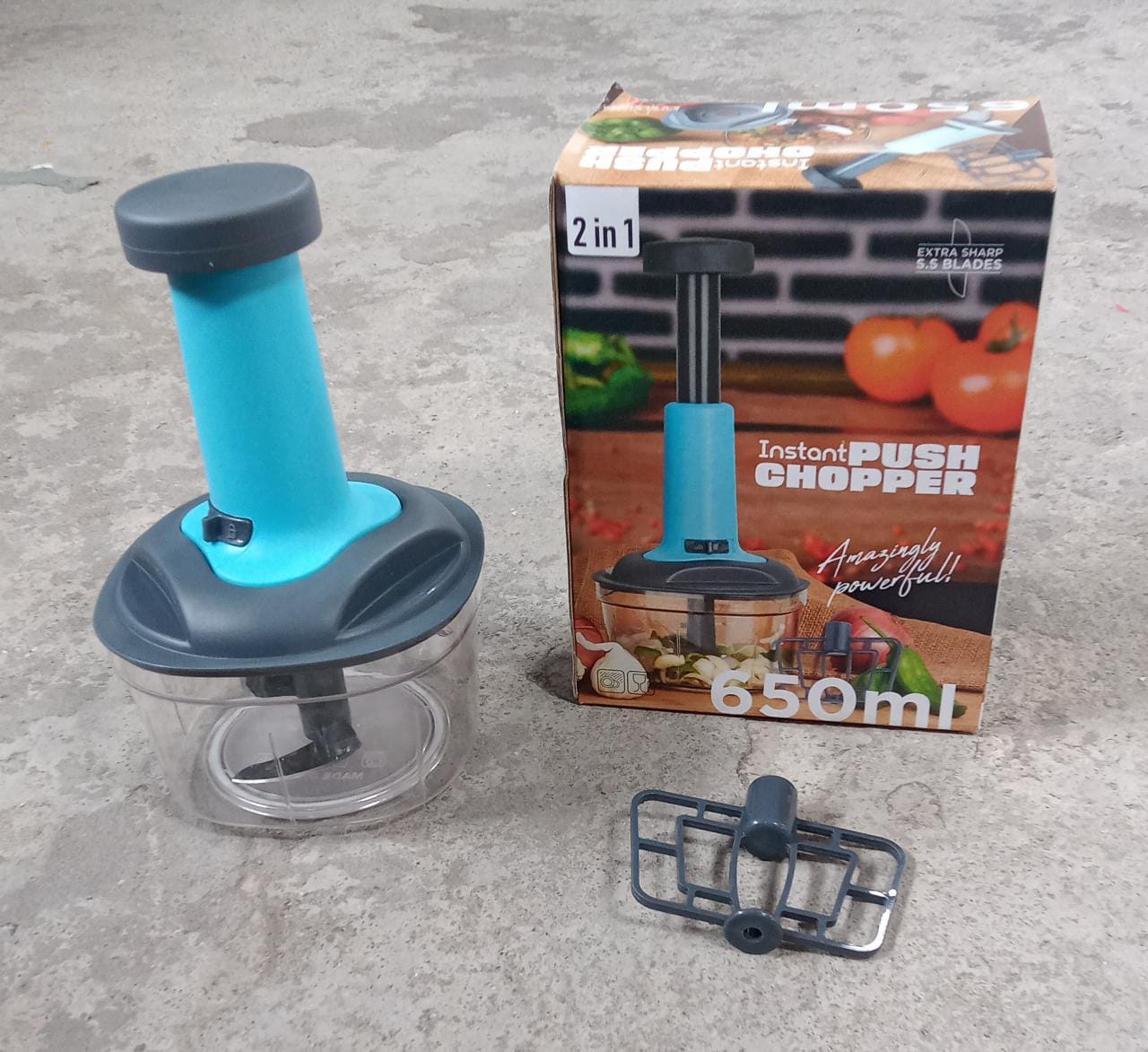 The complete set of the Quickslice hand push vegetable chopper, ready for all your meal prep.