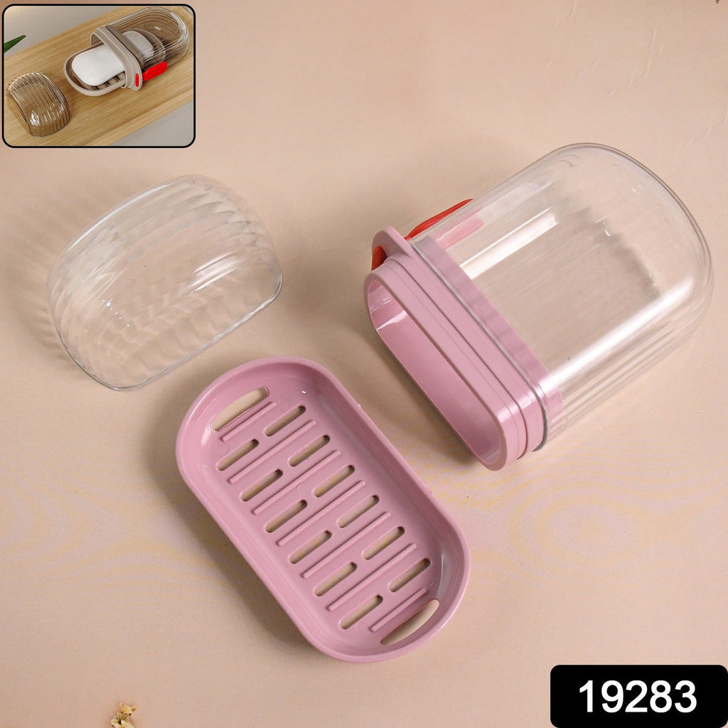 Pink plastic soap dish with clear dust shield lid protecting soap inside