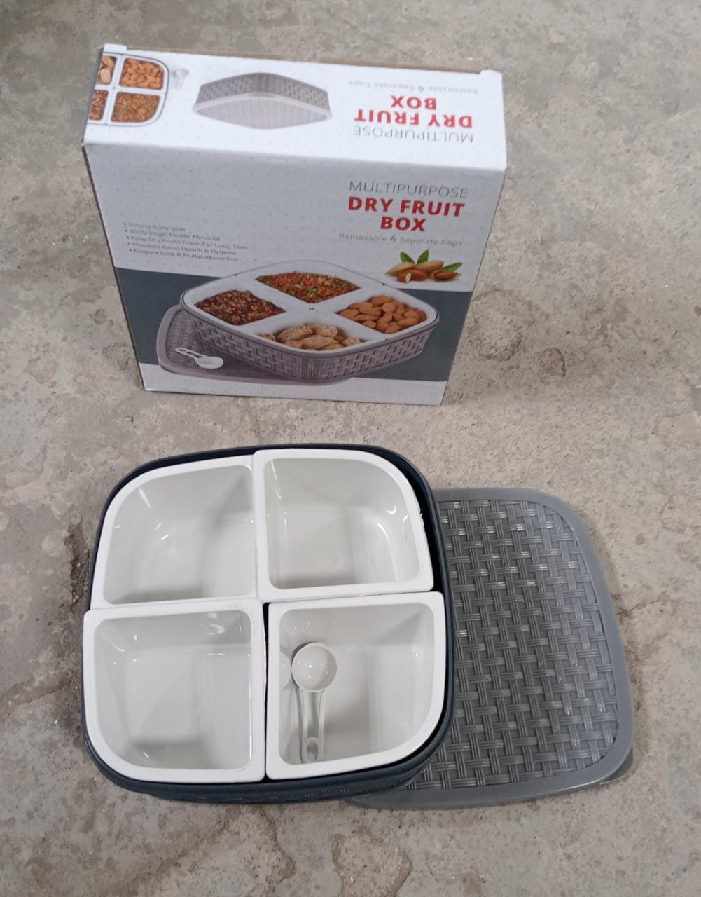 An empty multi-section food-grade plastic serving tray.