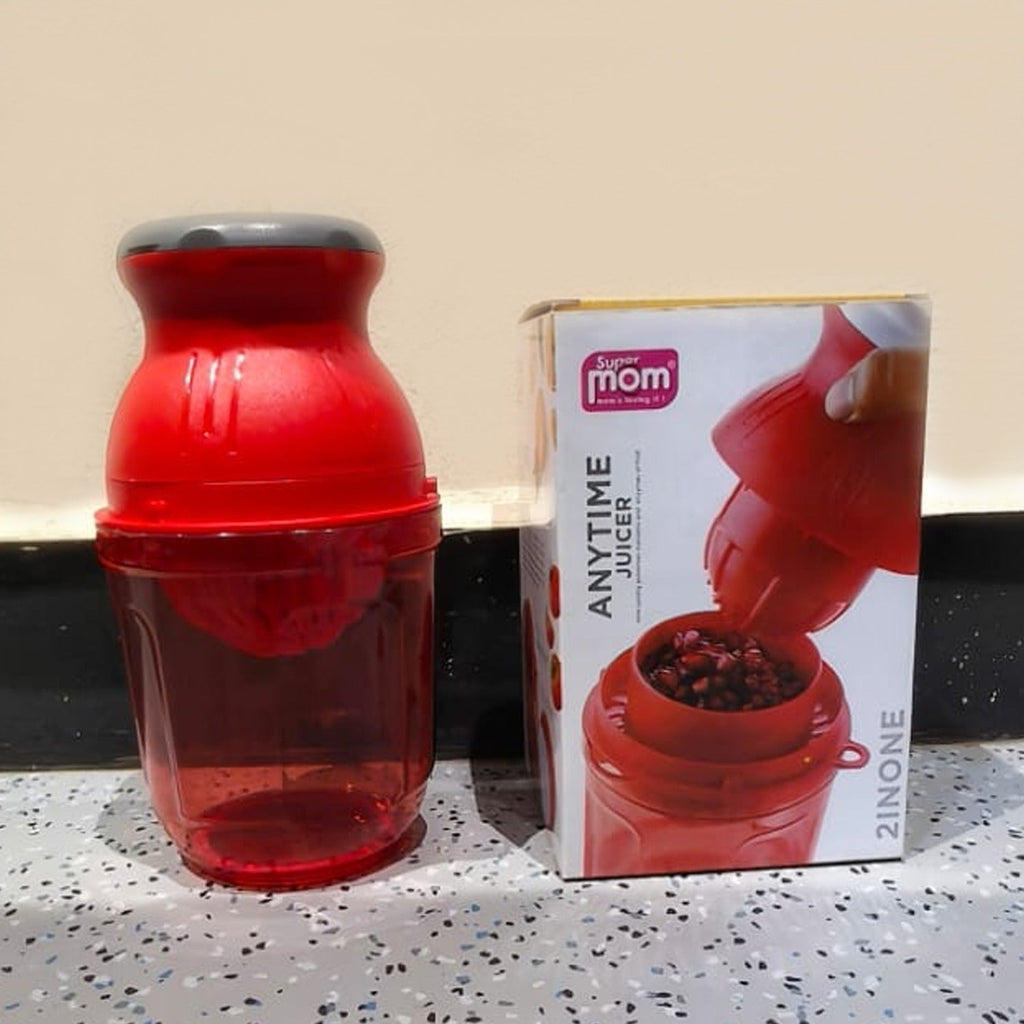Manual juicer in use squeezing fresh fruit juice easily