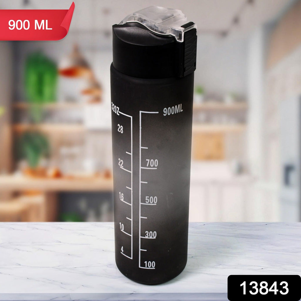 Ergonomic design of the black motivational water bottle with its integrated carry strap.