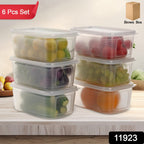 Clear plastic food storage containers stacked neatly for refrigerator organization