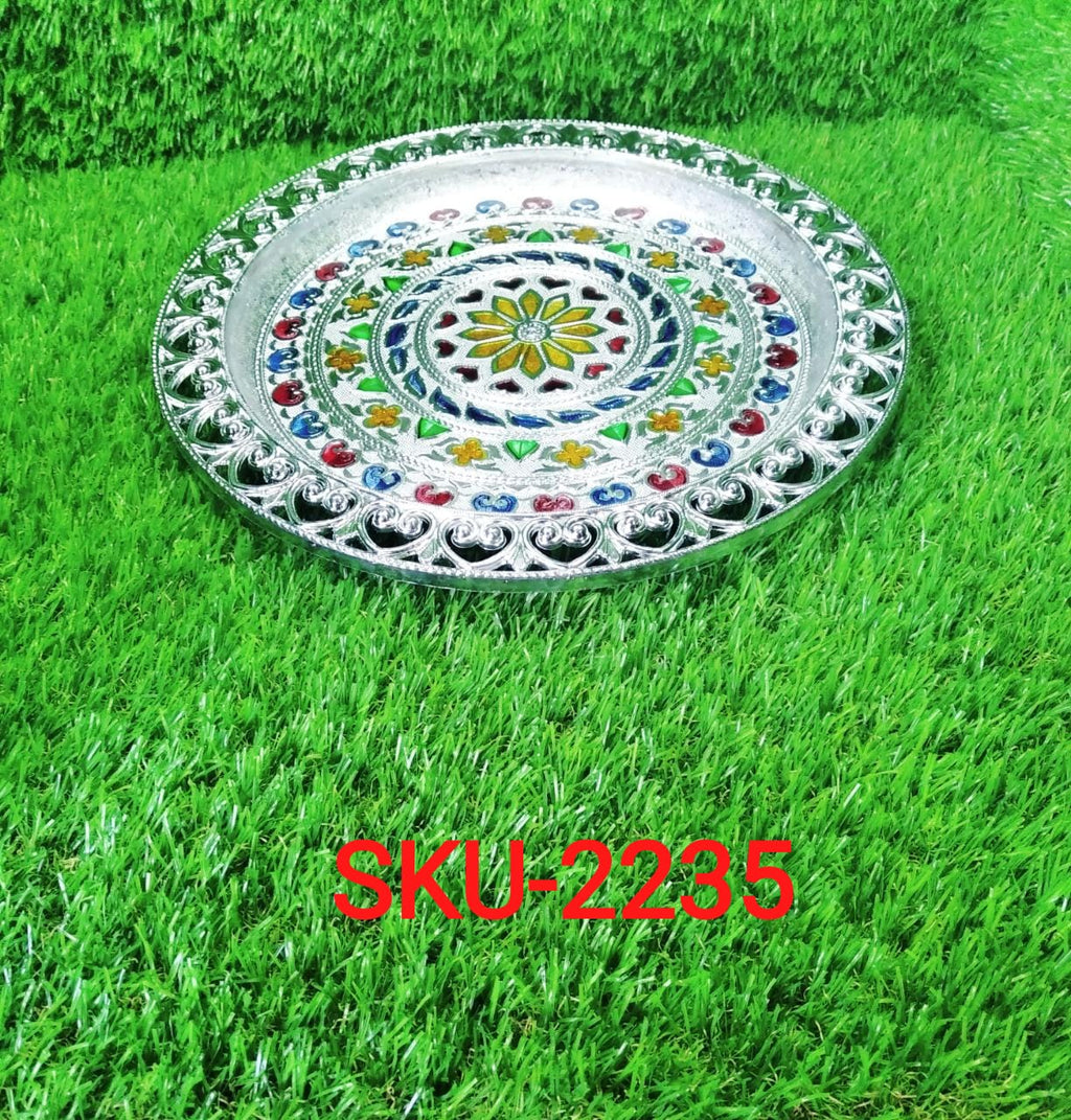Shiny silver plated thali, a spiritual centerpiece for any Indian home.