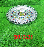 Shiny silver plated thali, a spiritual centerpiece for any Indian home.