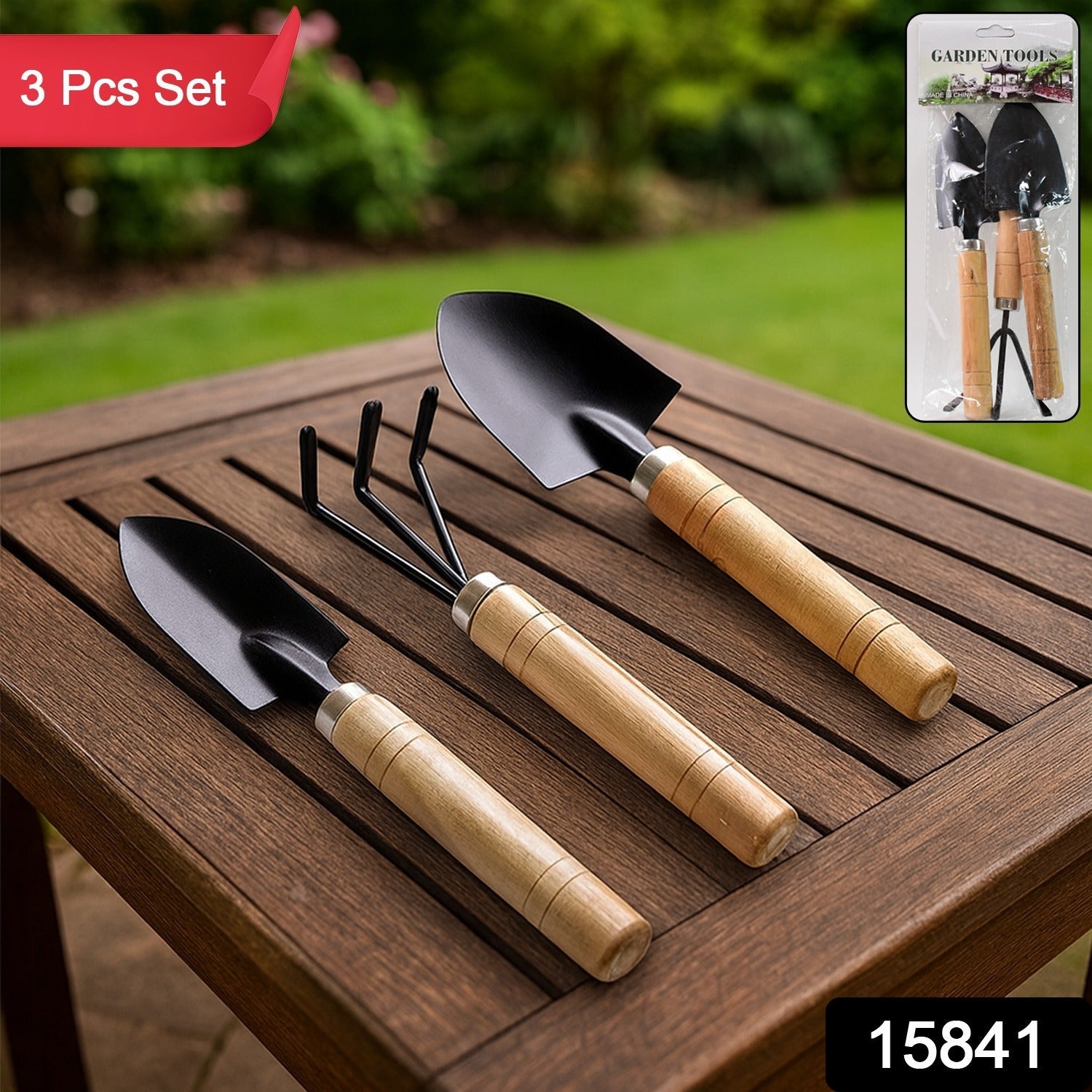Close-up of polished wooden handle on garden tool set