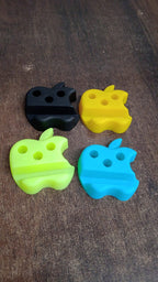Multi-functional apple-shaped mobile stand with pen holder holding smartphone and pens