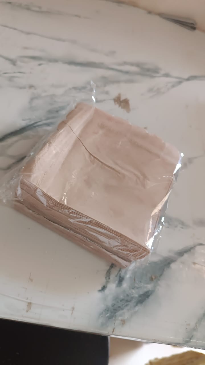 Scalloped edge tissue napkins styled for elegant table setting