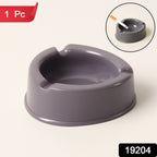 Heavy-duty grey plastic ashtray holding cigarettes securely