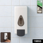 Front view of the refillable wall mounted soap dispenser with push button.