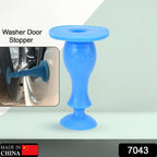 Washer door stopper holding a front load washing machine door ajar for ventilation.