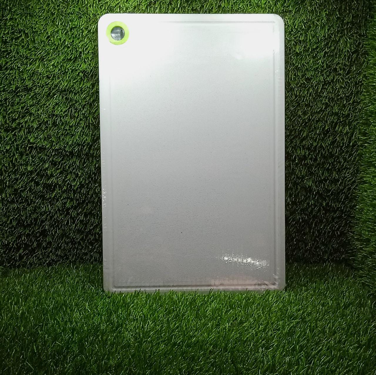 Hygienic and easy-to-clean plastic cutting board, ensuring safe prep for fruits and vegetables.