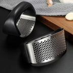 Fresh garlic cloves ready to be crushed with the efficient rocking garlic press.