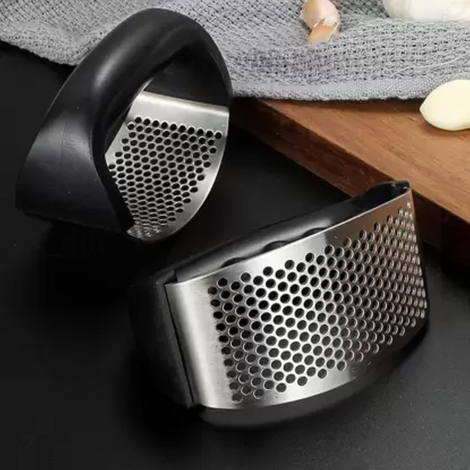 Fresh garlic cloves ready to be crushed with the efficient rocking garlic press.